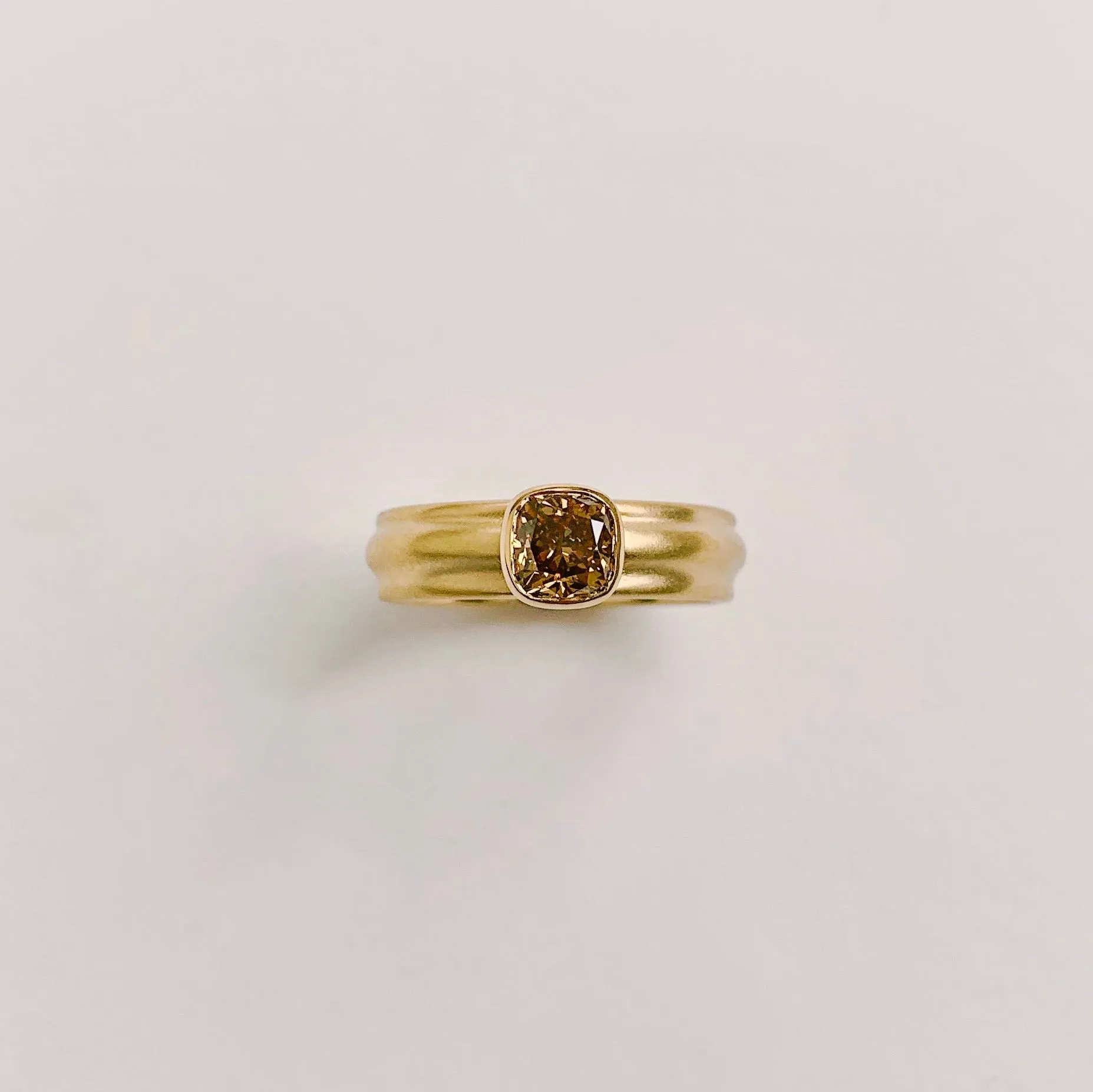 18k Royal, Wide Column Solitaire, with Fancy Deep Brown .79ct Argyle Diamond