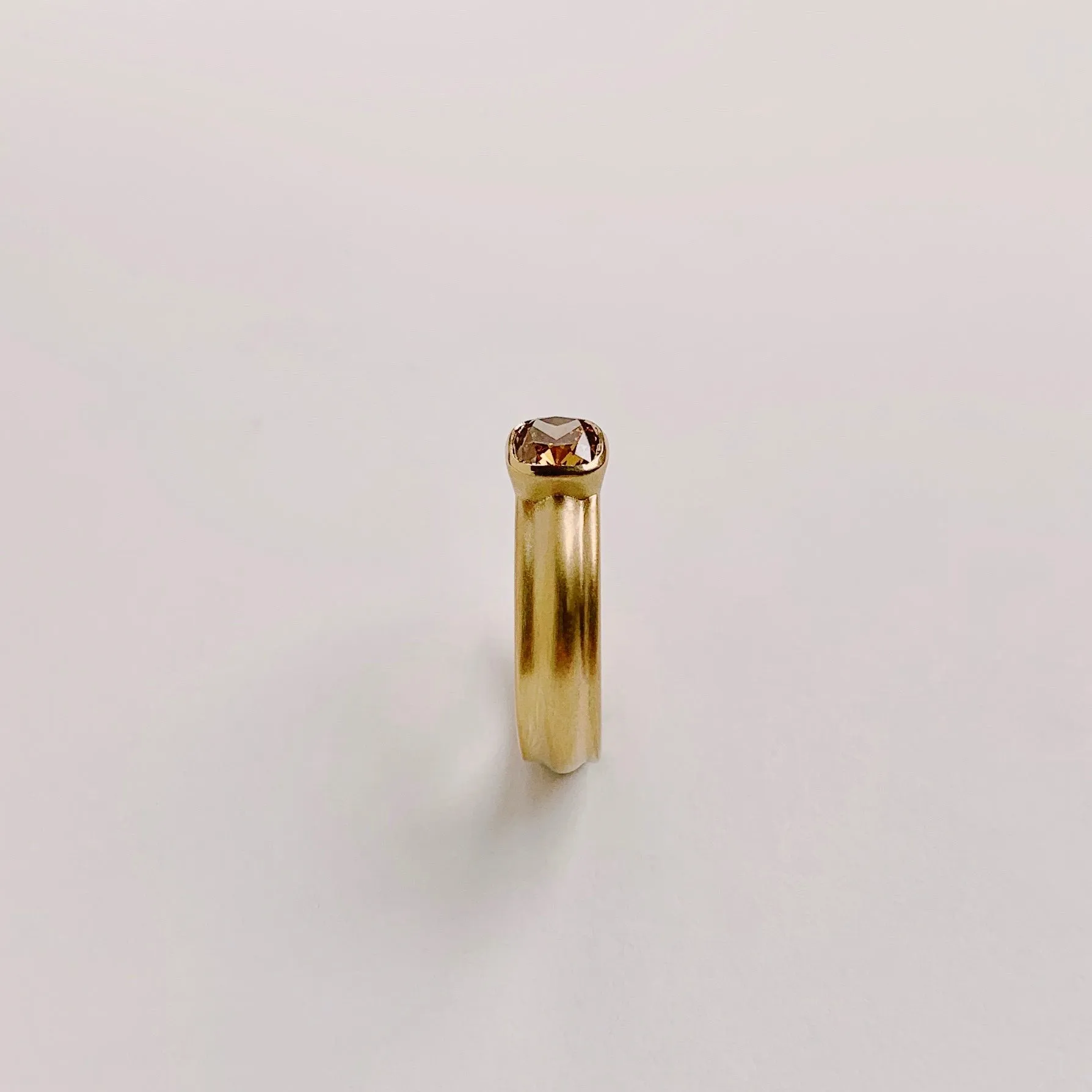 18k Royal, Wide Column Solitaire, with Fancy Deep Brown .79ct Argyle Diamond