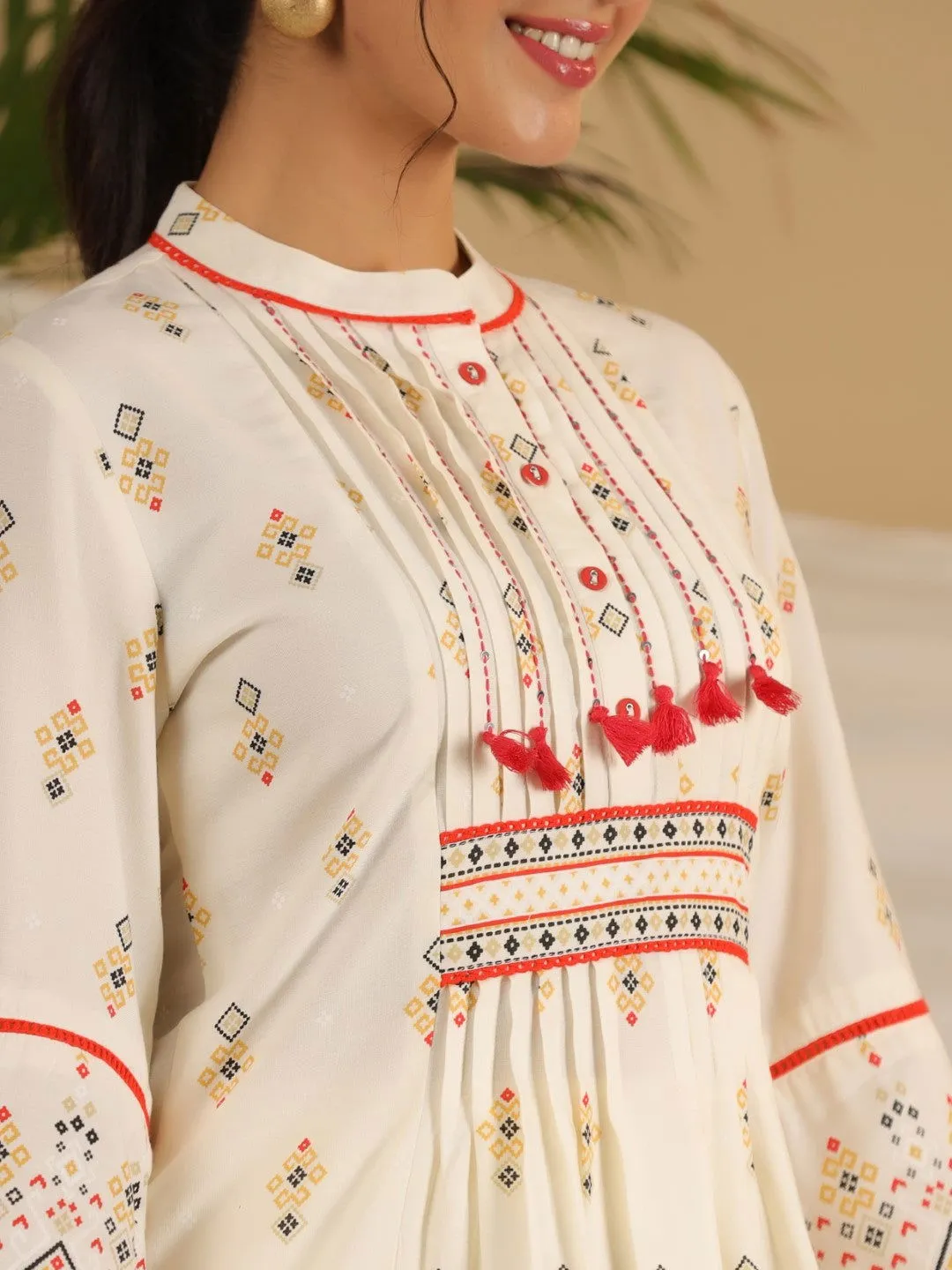 Juniper  Rayon Ivory Tribal Printed A-Line Pleated Co-Ord Set With Sequenced Thread Work