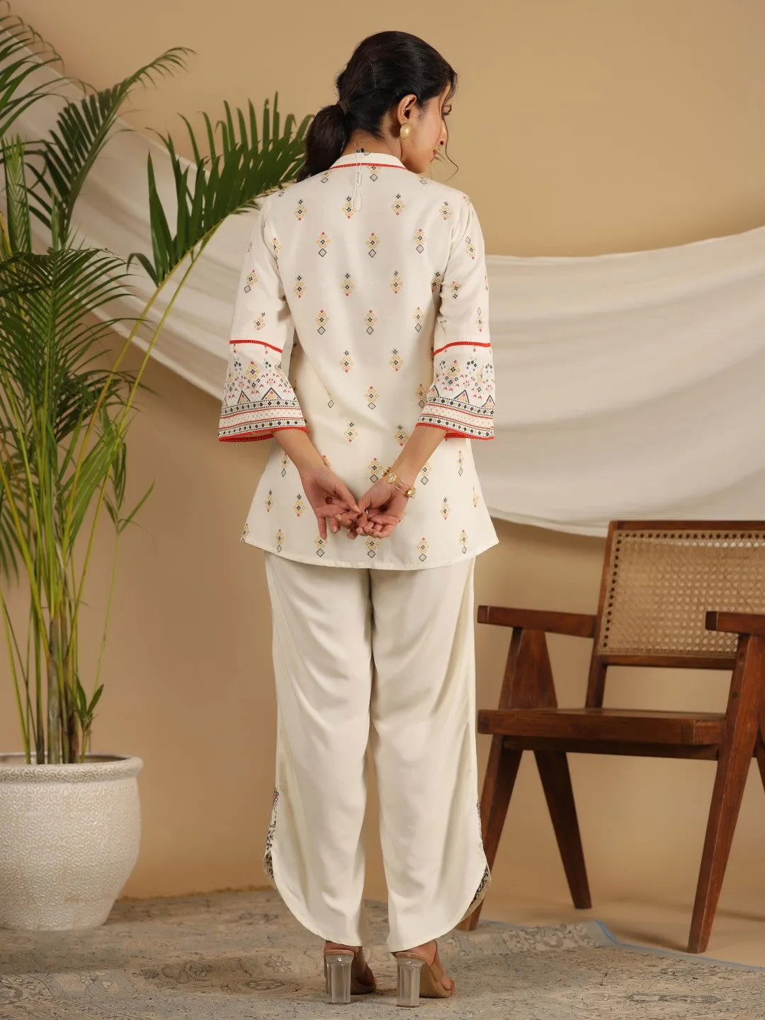 Juniper  Rayon Ivory Tribal Printed A-Line Pleated Co-Ord Set With Sequenced Thread Work