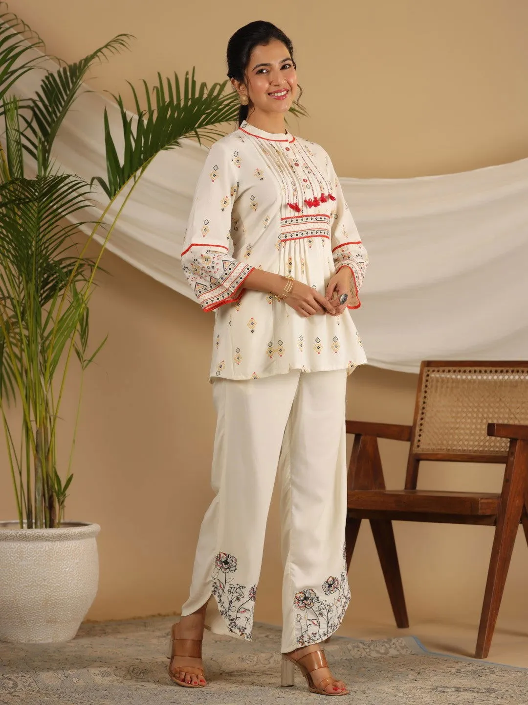 Juniper  Rayon Ivory Tribal Printed A-Line Pleated Co-Ord Set With Sequenced Thread Work