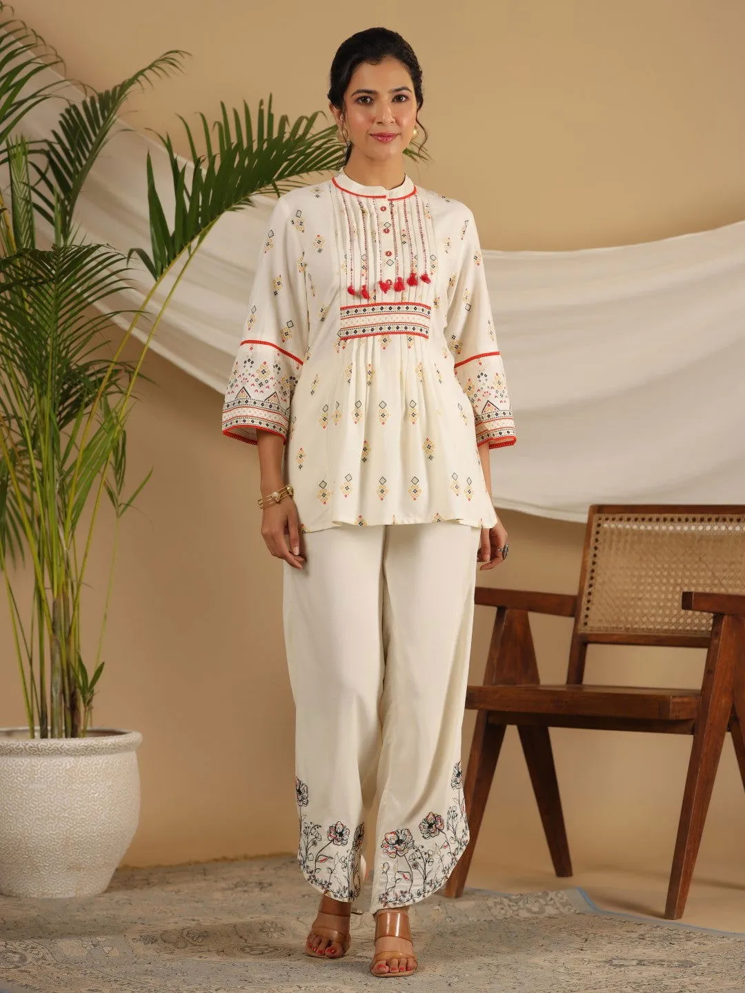 Juniper  Rayon Ivory Tribal Printed A-Line Pleated Co-Ord Set With Sequenced Thread Work