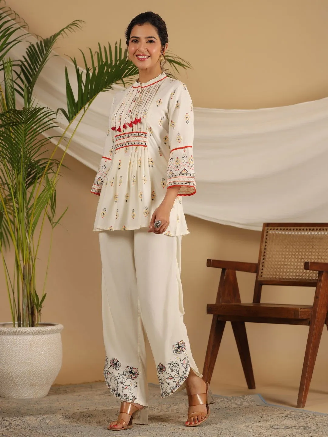 Juniper  Rayon Ivory Tribal Printed A-Line Pleated Co-Ord Set With Sequenced Thread Work