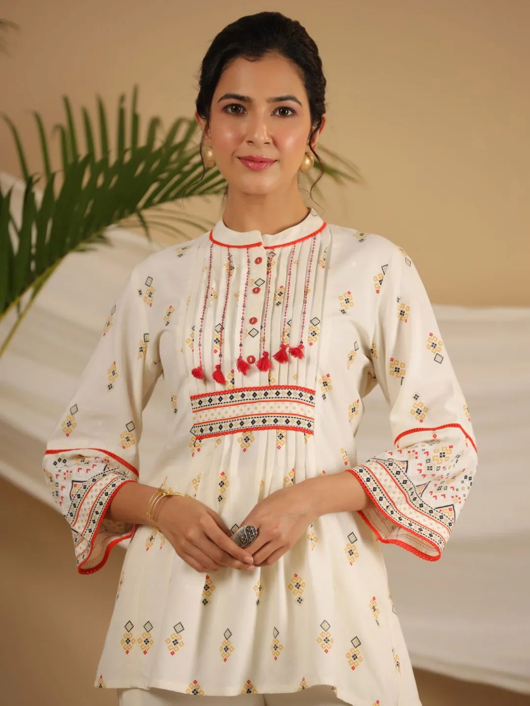 Juniper  Rayon Ivory Tribal Printed A-Line Pleated Co-Ord Set With Sequenced Thread Work