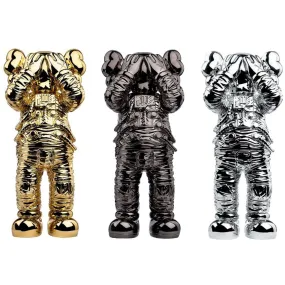 KAWS Holiday Space Figure Gold/Black/Silver Set