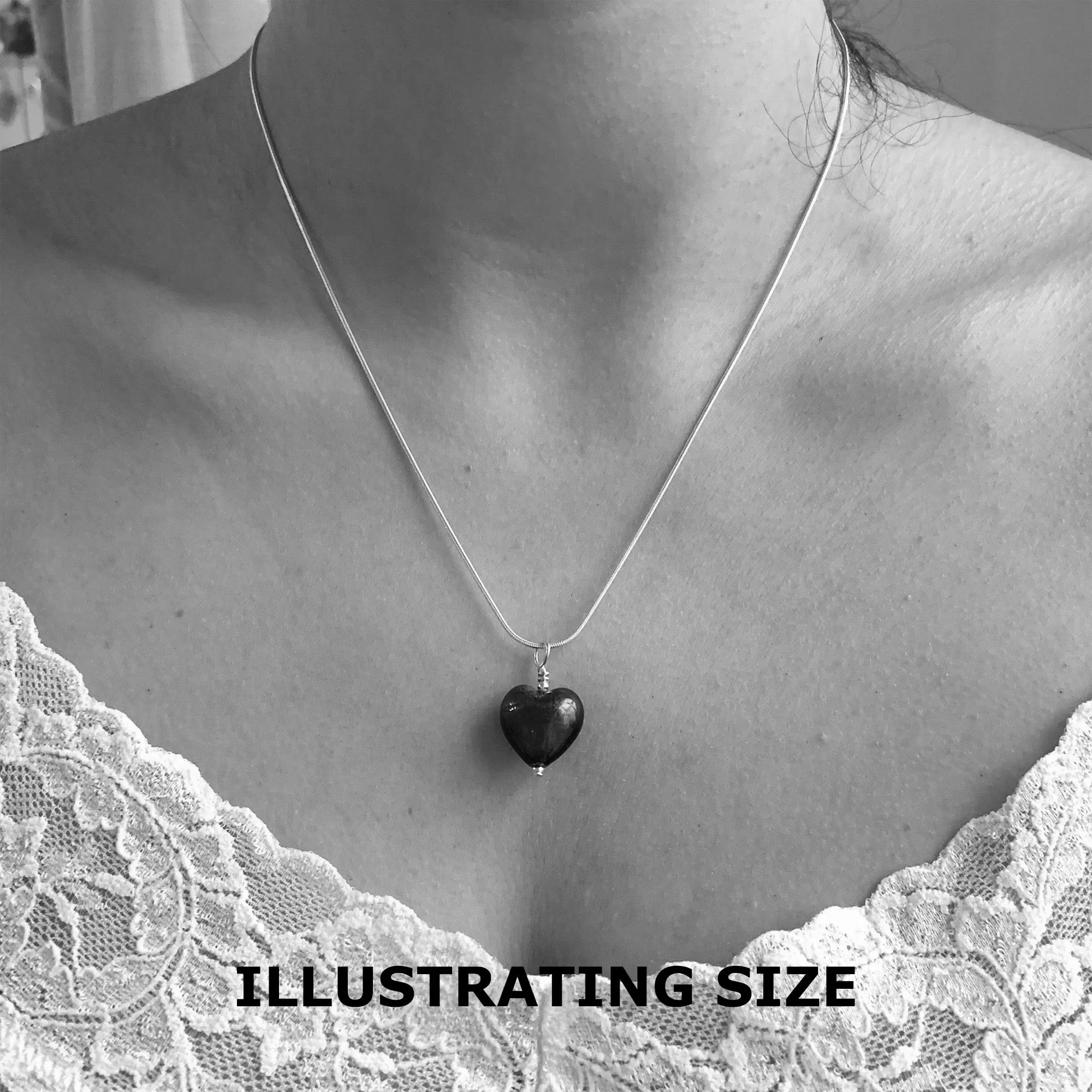 Necklace with orange pastel Murano glass small heart pendant on silver snake chain
