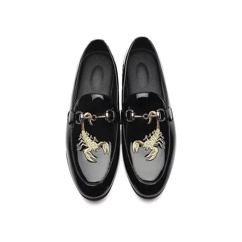 The Scorpio Patent Leather Penny Loafers